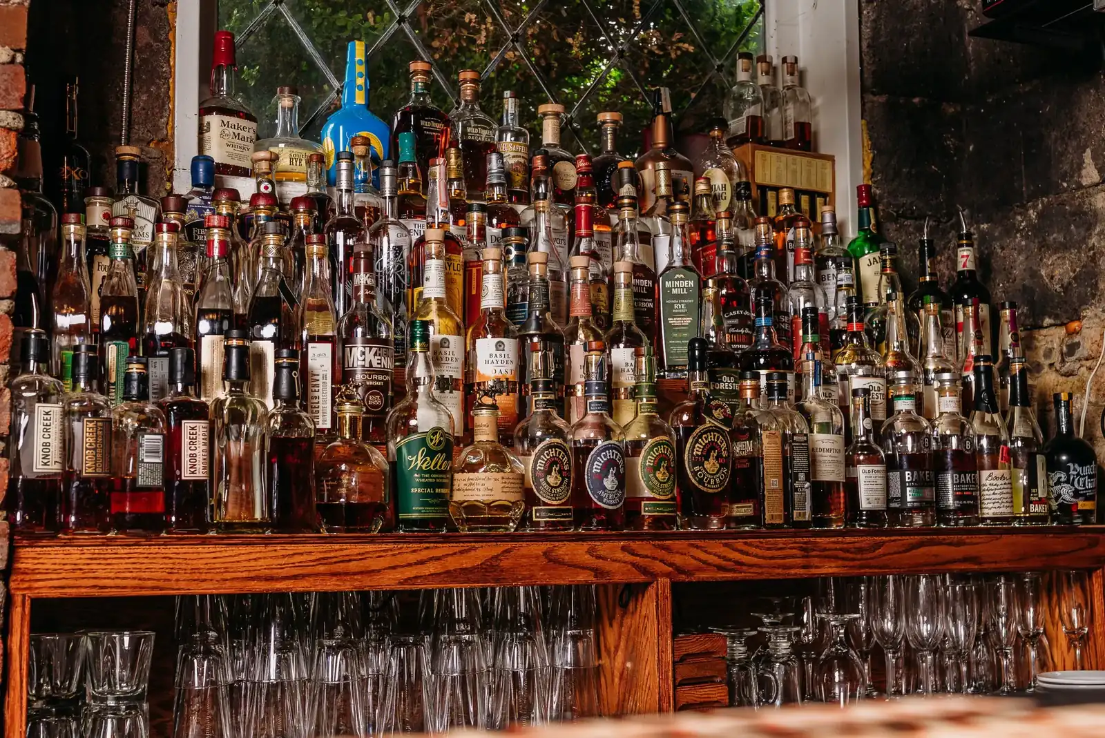 Bottle after bottle of bourbon on the back bar at Spirits